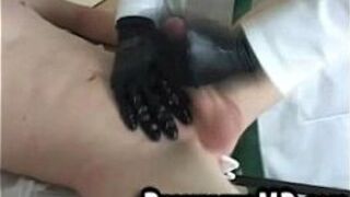 This sexy twink ginger patient gets jerked off by doctor in gloves porn video